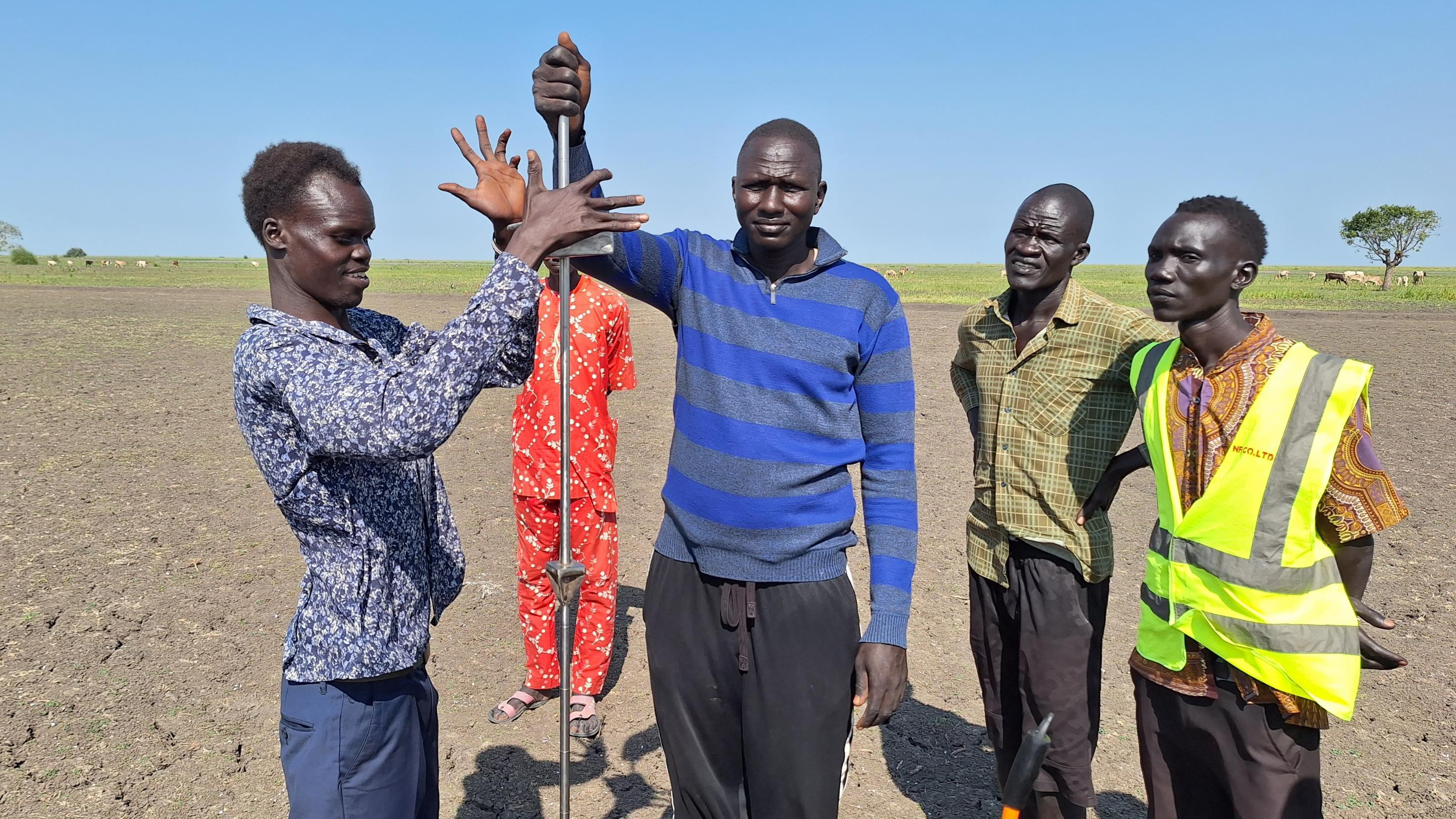 using a penetrometer to test the surface of the airstrip - Jono Pound