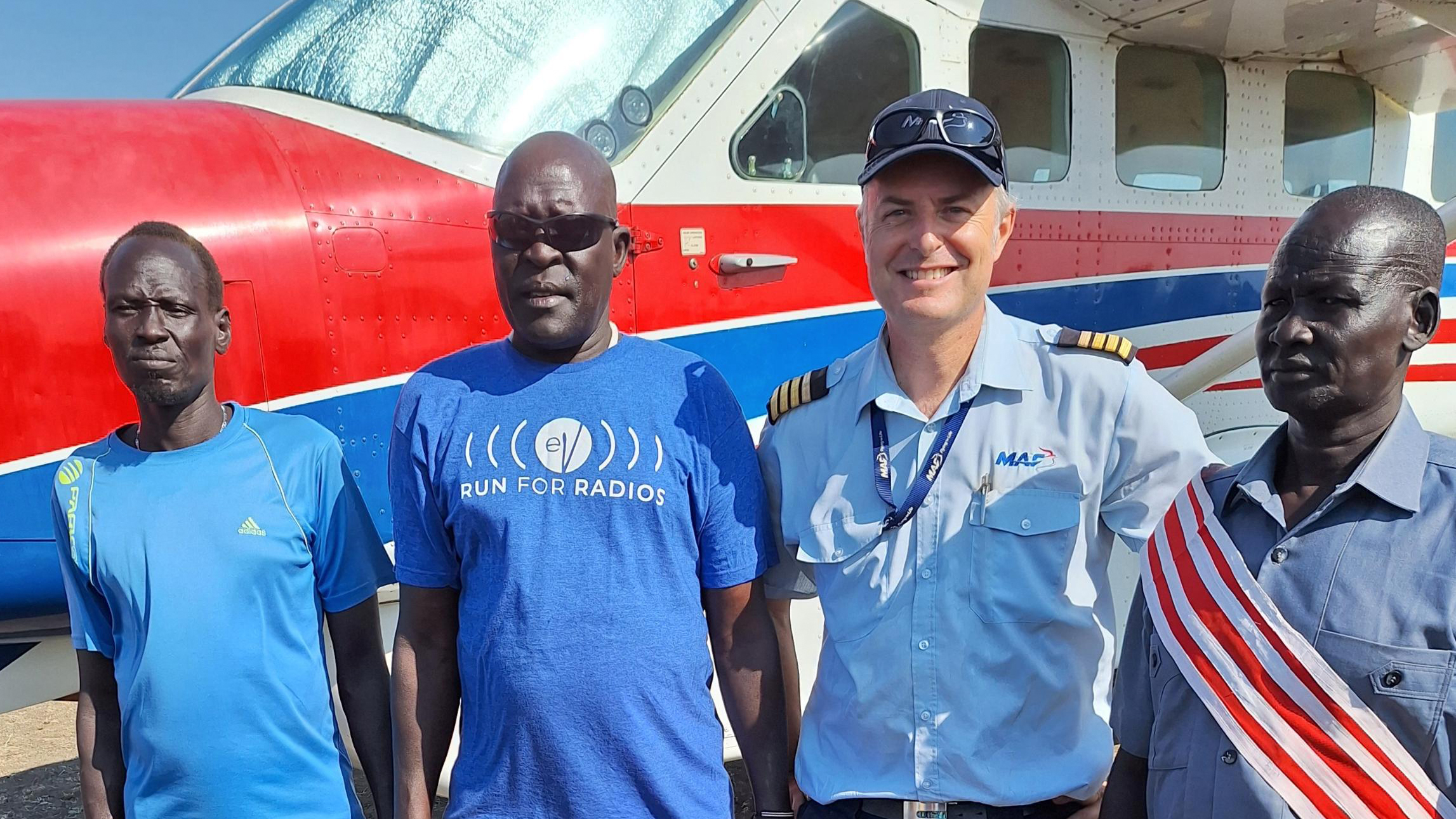 Torpuot Villagers gather to greet the plane - photo Jono Pound 