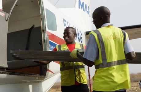 MAF staff loading the aircraft