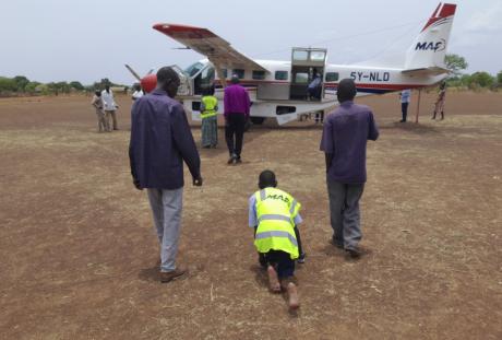 Boarding the plane in Mundri 