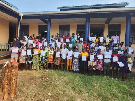 Workshop participants celebrate completing the course  